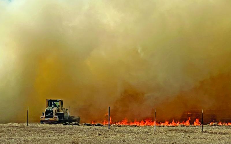 A dozer cuts a line through pastureland during a wildfire over the weekend. An uptick in grass fires was seen last weekend throughout the county, and Erath County along with several other surrounding counties are now under a burn ban. Kari Lanting | Courtesy photo