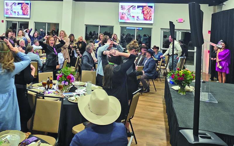 Crowds enjoy playing ‘Heads’ or ‘Tails’ in order to raise funds for Cross Timbers Fine Arts Council at its annual fundraising dinner Friday, Feb. 6 at The Legacy. For more photos see The Dublin Citizen Facebook page. Wyndi Veigel-Gaudette | Citizen staff photo