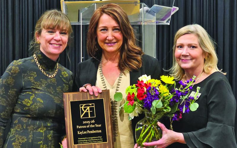 Patron of the Year KayLee Pemberton, center, is presented an award by CTFAC officer Stephanie Beach, left, and Executive Director Christine Newton, right. Wyndi Veigel-Gaudette | Citizen staff photo