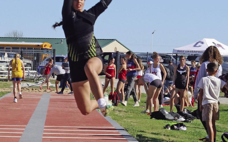 Dublin varsity Lady Lion Olivia Salyer placed first in the long jump at the Dublin Invitational Track Meet with a leap of 16’08.25”. Paul Gaudette | Citizen staff photo