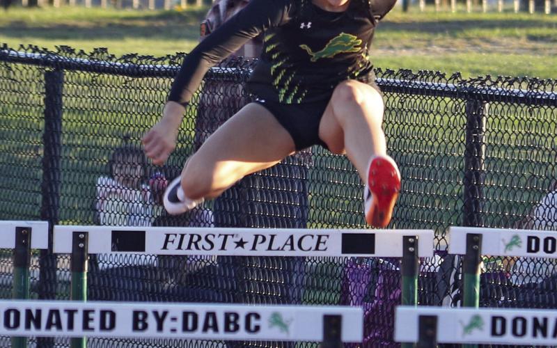 Dublin Varsity Lady Lion Kloie Whiteley hopped to a second place finish in both the 100 meter and 300 meter hurdles. Paul Gaudette | Citizen staff photo