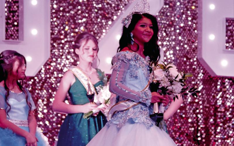 Junior Miss Dublin 2026 Ariyana Dominguez walks across the stage after being crowned Friday, March 13. Wyndi Veigel-Gaudette | Citizen staff photo