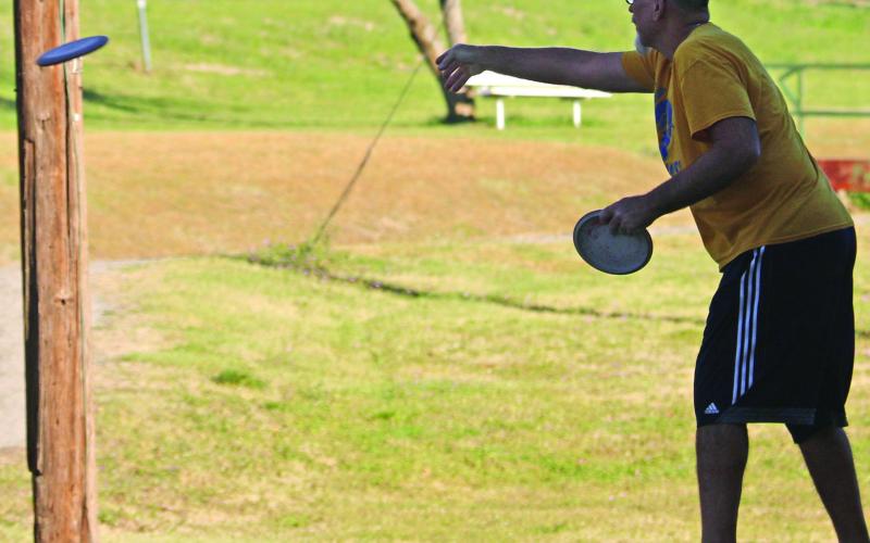 A disc golfer lets a frisbee fly at the annual Shamrock Shootout held Saturday, March 21. The event was held by the Dublin Disc Golf Association at the City Park. Wyndi Veigel-Gaudette | Citizen staff photo