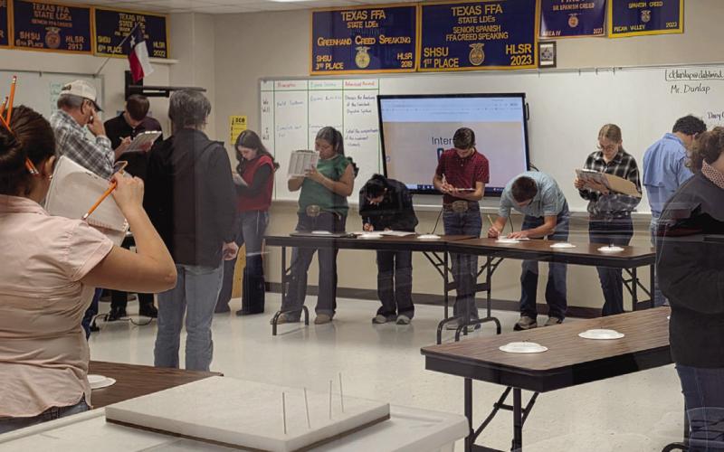 Wyndi Veigel-Gaudette | Citizen staff photo Senior FFA Member David Greene helps monitor a room competing in an entomology contest during Dublin FFA’s Career and Development Event Friday, Feb. 27.