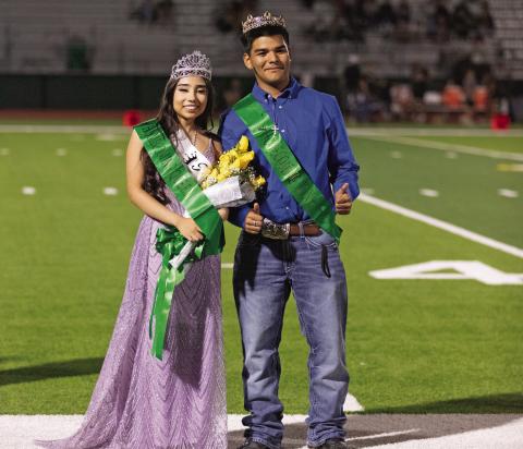 Homecoming Queen Kassandra Rodriguez and Homecoming King David Nava smile for photos after being crowned Friday, Sept. 26 at Dublin High School’s Homecoming. Danielle Meador | Citizen staff photo