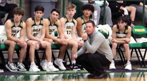 Paul Gaudette | Citizen staff photo Lions coach Wes Grisham lean in as Dublin faces Brownwood in their second game of the Dublin tournament Friday. Ayush Patel (left) led scoring for the team with 61 points across all three games.