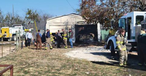 Dublin Volunteer FD members mop up after a garage fire occurred Saturday, Dec. 21 on Chancellor Street. The fire was ruled accidental after burning leaves got out of control. Firefighters were able to stop the fire from reaching the home, but the garage and vehicles were a total loss. An uptick in fires is being seen throughout the county due to dry conditions. Caution is urged by the fire marshal’s office, especially with high wind and low humidity. Wyndi Veigel-Gaudette | Citizen staff photo