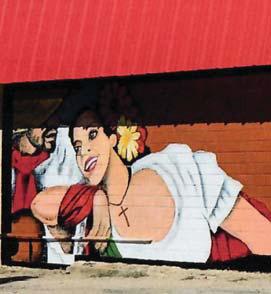 A new mural has been painted downtown by Judith Riola featuring bright colors and a guitar player. Submitted photo