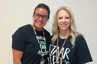 Intermediate School Teacher of the Month Principal Amanda Lisso with Intermediate School Teacher of the Month Mickey Pfliiger
