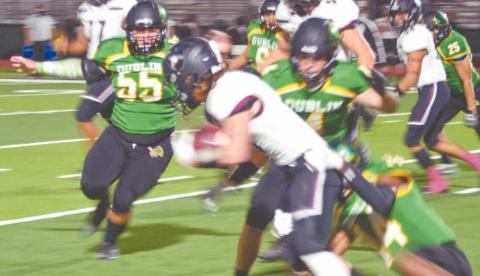 Dublin Lions defense surrounds a Millsap Bulldog ballrunner during the home game Friday night. Paul Gaudette | Citizen staff photo