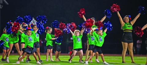 Dublin Dandi-Lion drill team members were aided at the home game Friday, Sept. 12 by a sea of small but spirited mini drill team members who got to show off routines they learned and help cheer on the Lions from the stands. Danielle Meador | Citizen staff photos