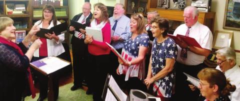 A choir of 10 kicked off a Thursday night Quilt of Valor Ceremony at Dublin Historical Museum with patriotic music. Honors were presented to Mark Hall (below, left) and Craig Washam, Jr. (below, right) who were draped in specially-made quilts in recognition of their service. Paul Gaudette | Citizen staff photos