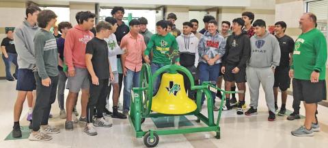 | submitted photo Athletic Director/Head football coach Greg Hardcastle and the Dublin Lions rang the victory bell in the Dublin Secondary School entryway Monday morning after defeating the Anson Tigers 24-21 Friday night.