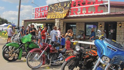 Bikes line up at Red Barrel Bar and Grill as the third annual Wheels of Hope fundraiser takes place for the Rylan Strong Network. The fundraiser will aid the nonprofit in assisting funerals of children who pass away from childhood cancer, childhood cancer research and aid for families battling with childhood cancer. For more photos of the event see The Dublin Citizen’s Facebook page. Paul Gaudette | Citizen staff photo