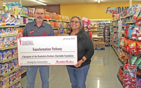 Dublin Brooksire Brothers manager Michael Beard presented a $2,000 check to Cindy Martinez for Transformation Pathway, Dublin’s Christian Women/Men’s Job Corps ministry. The funds came as part of $125,000 presented by The Brookshire Brothers Charitable Foundation to 53 nonprofit and educational organizations around Texas and Louisiana. Wyndi Veigel-Gaudette | Citizen staff photo