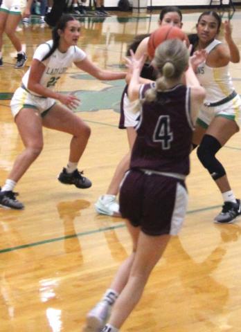Dublin Lady Lions Emma Vargas and Ingrid Hernandez guard against DeLeon ballcarriers in the Nov. 26 home game. Paul Gaudette | Citizen staff photo