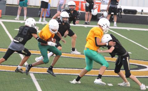 A Dublin JV Lion attempts to duck Clyde Bulldogs while a teammate blocks from the front during a scrimmage held Thursday, Aug. 17 at Clyde High School. The JV Lions have an off-week this week since Fort Worth Christian does not have a JV team. The Dublin JV boys return to Cervetto Field Thursday, Aug. 31 at 7 p.m. to take on the Albany Lions. This will follow 7th and 8th grade games starting at 4:30 p.m. Paul Gaudette | Citizen staff photo