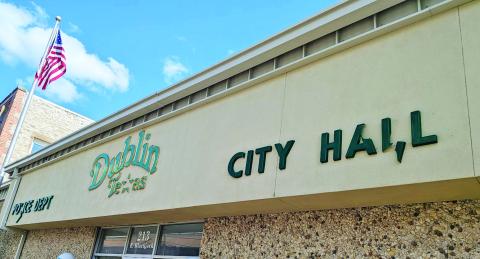 Letters from the Dublin City Hall sit shattered after being hit by tennis to baseball size hail Sunday, May 10 after a severe hailstorm. Large amounts of damage can be seen throughout town as repairs to homes, cars and roofs are underway. Paul Gaudette | Citizen staff photo