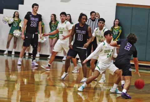 Dublin cheerleaders yell for defense as the Lions move to block Tolar ballcarriers from scoring in the final home game of the regular season Friday, February 13. The Lions are playoff bound and expected to face either City View or Henrietta. Paul Gaudette | Citizen staff photo
