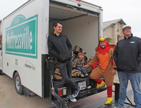 Matressville handed out over 200 pounds of turkey to eager turkey lovers in Stephenville Saturday, Nov. 19. Hundreds braved the cold to get a free turkey to be used in Thanksgiving meals this week. Matressville General Manager Ira Goodman embraced the event by once again donning a turkey costume. Wyndi Veigel | Citizen staff photo