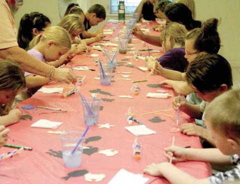 Participants at First Baptist Church’s SCUBA Vacation Bible School enjoy putting together some sea-based crafts. The church held VBS July 15-18. Wyndi Veigel-Gaudette | Citizen staff photo
