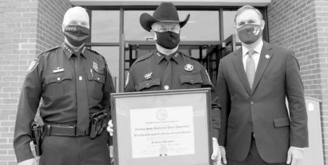 Fort Worth Police Chief Ed Kraus (left) presented the prestigious Law Enforcement Agency Award to Tarleton’s University Police Department Monday during ceremonies on the Stephenville campus. Receiving the honor are Tarleton Police Chief Matt Welch and President James Hurley. | submitted photo