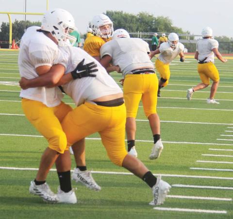 Dublin Lions practice tackling on Cervetto Field Saturday, Aug. 10 prior to an inter-squad scrimmage. The morning was the first practice in full equipment for the season. Wyndi Veigel-Gaudette | Citizen staff photo