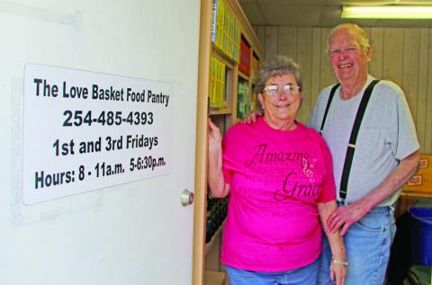 Ray and Barbara Sissom have dedicated the past 20 years making sure people are fed through The Love Basket. The food pantry is open the first and third Friday of every month. Submitted photo