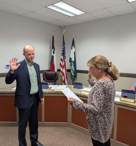 Bo Kabala, who was recently elected to Dublin City Council Place 1, is sworn into office by City Secretary Kim Seider at the Monday, June 9 City Council meeting. Paul Gaudette | Citizen staff photo