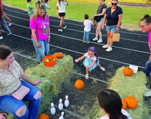 Students from Dublin Elementary and Dublin Intermediate School play a variety of games including pumpkin bowling at the Fall Festival organized by the Dublin PTO Friday, Oct. 3 at Memorial Stadium. The event allows students to enjoy fall fun while raising funds for the PTO. For more photos see page A8 or go the Dublin Citizen Facebook page. Wyndi Veigel-Gaudette | Citizen staff photo