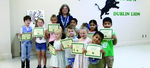 Lion Leaders Jasper Norman and Maisie Van Valkenburg (Pre-K), Luke Cifuentes and Carly Crews (Kindergarten), Brayan Campos and Isela Perez Macias (1st grade) Second graders Mateo Macias and Dylan Stone and Quinn Grisham and Ryan Neagle (3rd grade). Presented by Principal Brandy Carr.