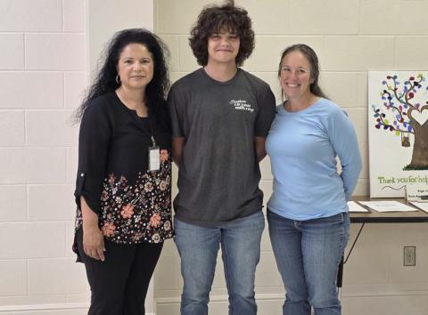 Dublin High School student Travis Spharler was recognized by the Dublin ISD School Board Monday, June 23 for his accomplishment at State in UIL Theatrical Design. He was awarded 12th in the State in both 1A and 3A divisions for his set design for the play 'Axoloris: the Musical.' He is accompanied by theatre teacher Aimee Spharler and High School Principal Norma Villicana-Arreguin. It is his second time at State in this division. Wyndi Veigel-Gaudette | Citizen staff photo