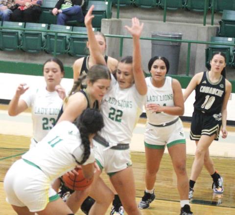 Dublin Lady Lions converge on a Comanche ballcarrier to defend in the Dec. 20 home game. Paul Gaudette | Citizen staff photo