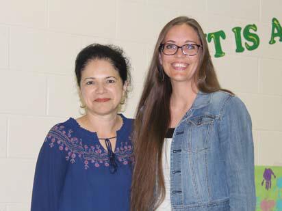 High School Teacher of the Month Principal Norma Briseno presents teacher of the month to Kimberly Vanbebber.