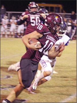 Lingleville Cardinal Klaas Schievink rushes the ball past Perrin Pirate defense Thursday night on the Lingleville field. Thursday was Senior night in which the following players (and their parents) were honored: Izzy Juarez, Leon Cruz, Schievink, Joseph Briseno, Damian Ortuno, Rocky Rangel, Bryson Vann, Xavier Figueroa and team manager Colton Dominguez. Paul Gaudette | Citizen staff photos