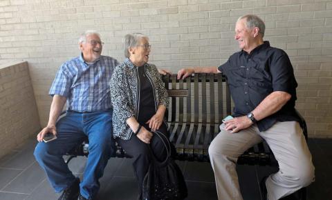 Siblings David, Gwen, and Retired Judge Donald Jones sit on a bench outside the Donald R. Jones Justice Center. The bench was placed in dedication to their parents K. Ewell and Fritzi Lucille Jones. A formal dedication of the bench and the Donald R. Jones Justice Center was completed Friday, April 11. Wyndi Veigel-Gaudette | Citizen staff photo