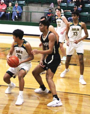 Dublin Lion Francisco Garcia Looks to move the ball around Comanche Indian defense while Dane Lewis and Ayush Patel stand poised to receive. The Dublin boys fell to Comanche 72-48 in a Jan. 10 home game before heading to Eastland on Jan. 13 being eked out in a 58-55 nail biter with the Mavericks. Paul Gaudette | Citizen staff photo