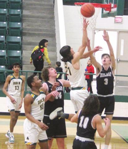 Dublin Lion Cooper Hubble takes to the air past Millsap defense to sink a 2-pointer in Saturday’s home win. Paul Gaudette | Citizen staff photo