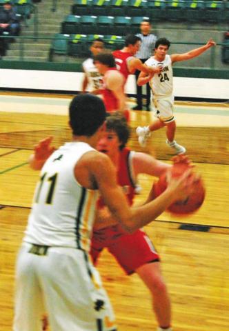 Dublin Lion Daniel Escobar looks to pass the ball during a recent home game while teammates Tyler Harrell and Chris Teten break free to receive. Paul Gaudette | Citizen staff photo