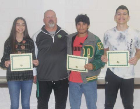 Athletic Scholars for November and December November: (not present) Jayden Balvantin and (not present) Ashton Munoz (Junior High School) and Alonso Moreno and Olivia Salyer (High School). December: Jax Johnson (not present) and Kimberly Ortiz (not present) (Junior High) and Aidan Hernandez and Yesenia Osoria (not present) (High School). Presented by Athletic Director Greg Hardcastle.