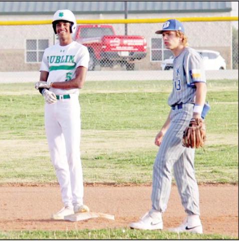 Dublin Lion Dalan Rasberry smiles at second base after scoring one of the only hits against state-ranked Brock in the March 30 home game. Wyndi Veigel I Citizen staff photo