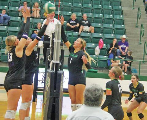 Lady Lion Bailey Watson meets Tolar Rattlers at the net in an Oct.8 battle in the Roy and Lynn Neff Gym while teammates Derby Kukla and Emma Mitchell stand poised to assist. Paul Gaudette | Citizen staff photo