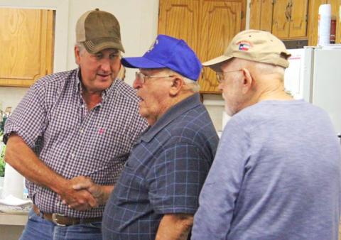 Stanley Anderson, a longtime Dublin volunteer of organizations like the Masonic Lodge and Dublin Rodeo Heritage Association, shakes hands with friends at his surprise 80th birthday party held Saturday, May 6 at First Baptist Church. Paul Gaudette | Citizen staff photo