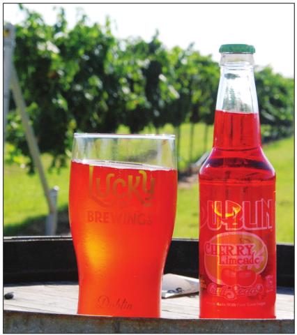 A hard seltzer made from Dublin bottling Works Cherry Limeade is only own of many flavors created by Ryan Hoffman (left), head brewer at Dublin’s Lucky Brewing Company. The flavors were being served at a soft opening last weekend in the new patio area at Lucky Vines. Paul Gaudette | Citizen staff photo
