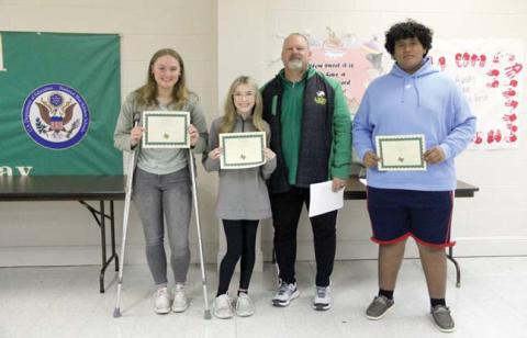 Athletic Scholars Junior high athletes Luis Elicerio and Tylor Nail and High School athletes Emmanuel Ramirez (not pictured) and Sydney Master. Presented by Athletic Director Greg Hardcastle.