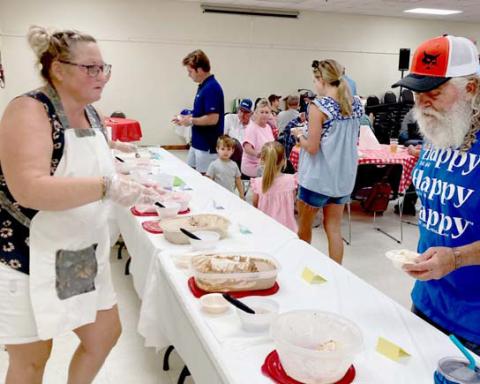People of all ages enjoyed the annual Freeze Off in Morgan Mill over the weekend, sampling homemade ice cream. Cindy Combs | Citizen staff photo