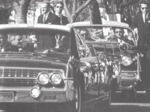 The above photo, donated to the Dublin Historical Museum by Rheagen Russell, shows the presidential motorcade driving from Love Field as it approaches downtown Dallas in November 1963. The photograph was taken about 15 minutes before the assassination. Below, headlines inform readers about President Kennedy’s assassination. | submitted photos