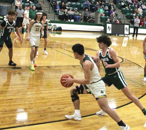 Dublin Lion Aidan Hernandez leans past Breckenridge defense during a home game Friday, Jan. 5. Paul Gaudette | Citizen staff photo