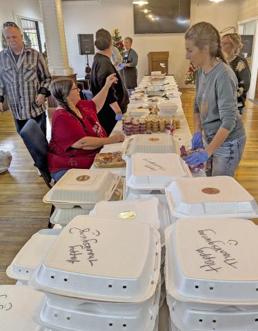 Volunteers with Dublin Family Worship work together on Thanksgiving to fill more than 250 boxes for delivery to families throughout the community that needed a meal on the holiday. Paul Gaudette | Citizen staff photo