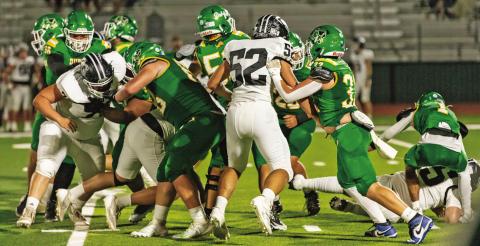 Dublin Lions clash with Lindsay at the line of scrimmage Friday, Sept. 26 during the homecoming game. Danielle Meador | Citizen staff photo